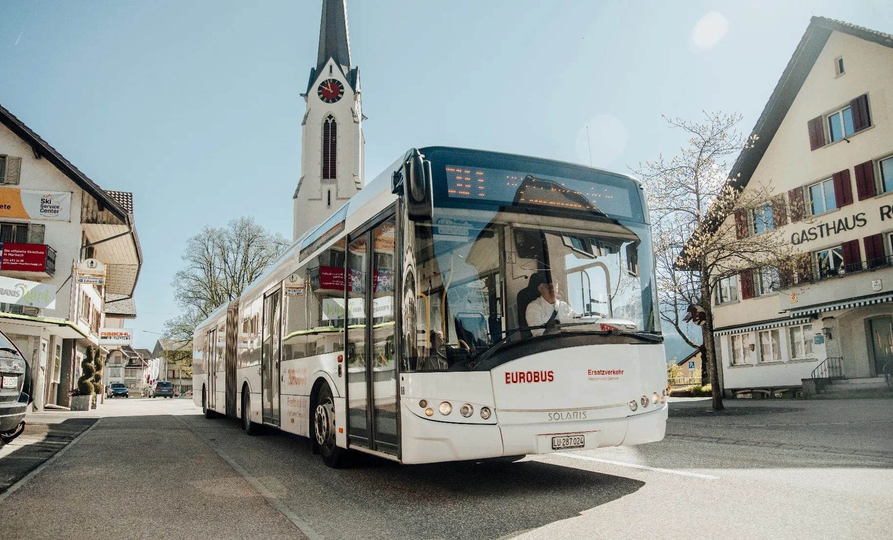 EUROBUS articulated bus in a village centre