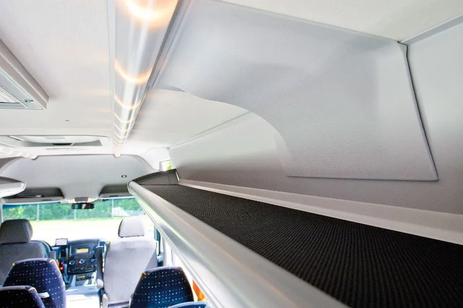 Luggage rack and ceiling inside the minibus