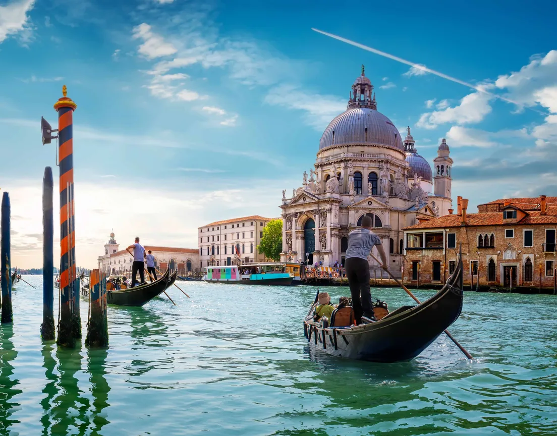 Gondolas on the Grand Canal in front of the Basilica of Santa Maria della Salute in Venice